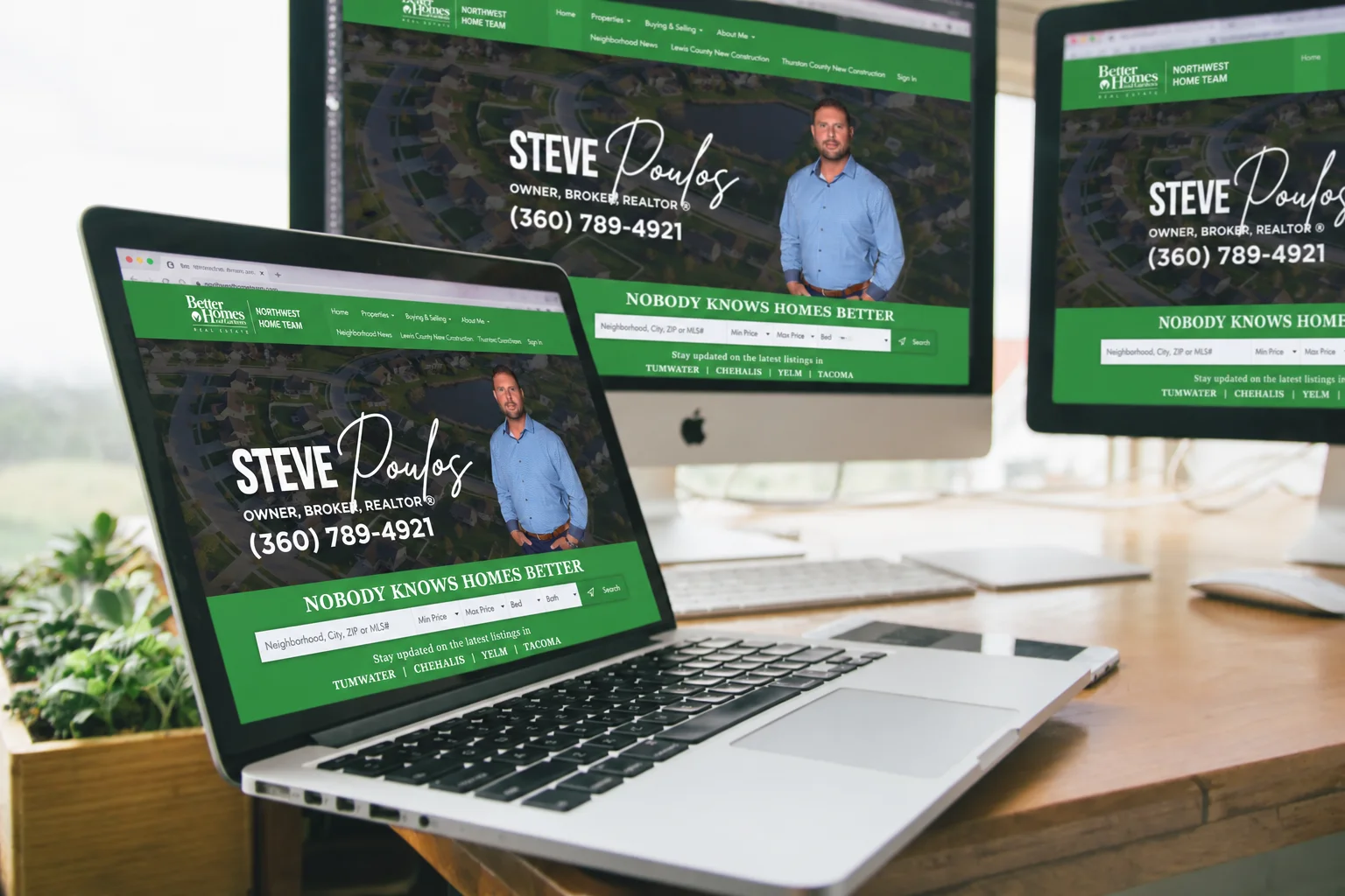 Real estate website displayed across desktop and laptop screens
